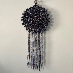 Boho dream catcher with blue and cream variegated fuzzy yarn and clear beads